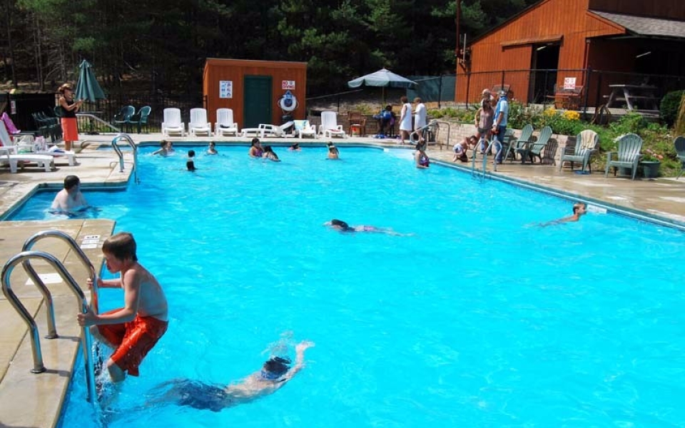 Kids Playing in Pool at Adirondack Camping Village